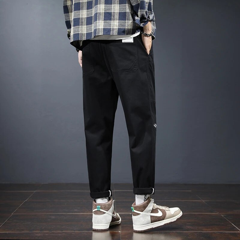 2023. gada rudenī populāras vīriešu ikdienas bikses, mīkstas, ērtas, brīvas, pieguļošas, daļēji elastīgas, plānas vīriešu bikses