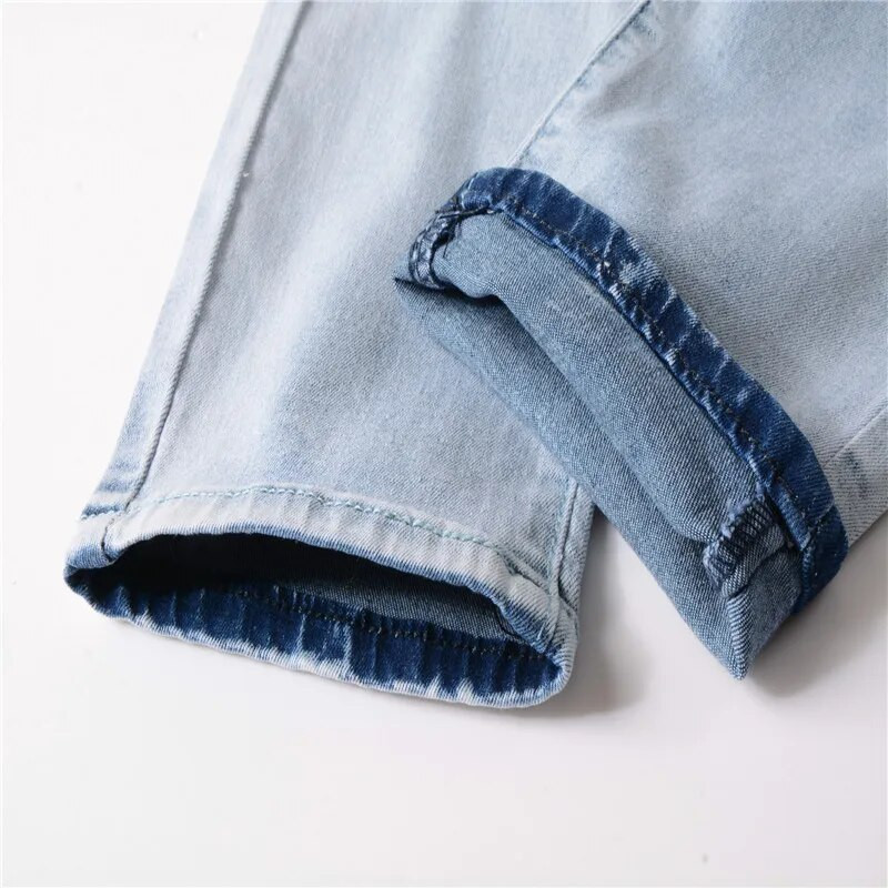 Augstākās kvalitātes 2022. gada modes modes ikdienišķas, caurumu salocītas kroku džinsi vīriešiem, elastīgas kājas, krokas, vīriešu džinsi, hiphopa zīmuļu bikses