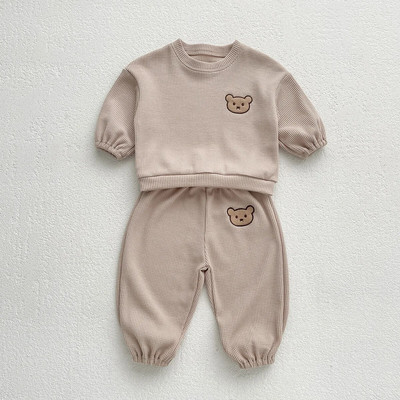 Lastekomplekt Tüdrukute ja poiste triibud kevadine ja sügisene vabaaja multikas Väike karu, kaheosaline komplekt Korea versioon