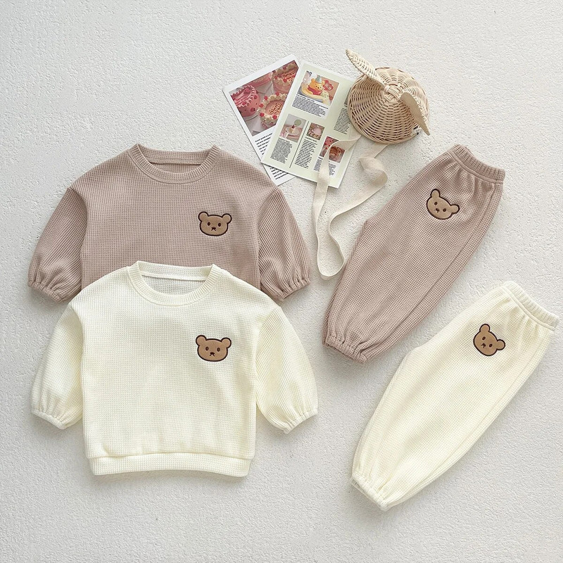 Lastekomplekt Tüdrukute ja poiste triibud kevadine ja sügisene vabaaja multikas Väike karu, kaheosaline komplekt Korea versioon