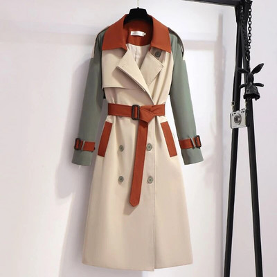 Modes kontrasta šuves garā temperamenta vējjakā sieviešu pavasara un rudens jaunais korejiešu variants, brīvs jostasvietas plāns mētelis