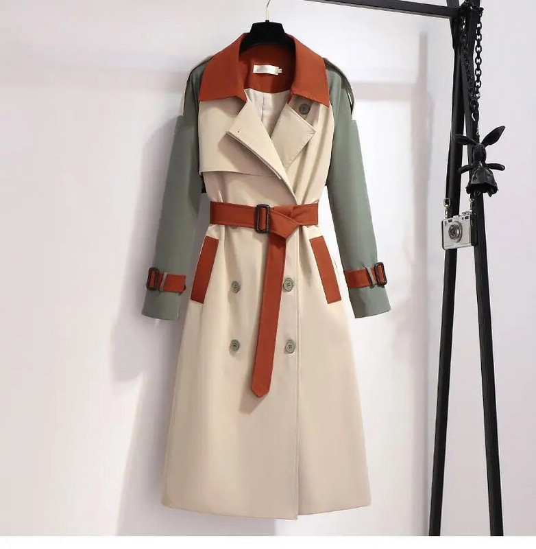 Modes kontrasta šuves garā temperamenta vējjakā sieviešu pavasara un rudens jaunais korejiešu variants, brīvs jostasvietas plāns mētelis