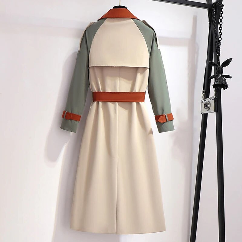 Modes kontrasta šuves garā temperamenta vējjakā sieviešu pavasara un rudens jaunais korejiešu variants, brīvs jostasvietas plāns mētelis