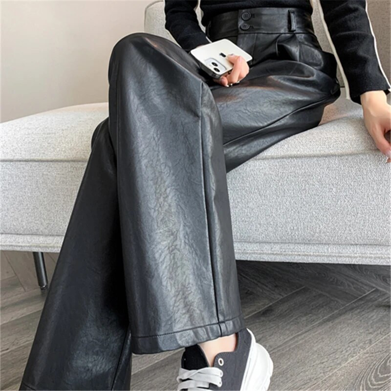 Seulas rudens ziemas pogas sieviešu PU ādas bikses 2023. g. Jaunas ar augstu vidukli, platas kājas, pilna garuma brīvas bikses, sieviešu bikses