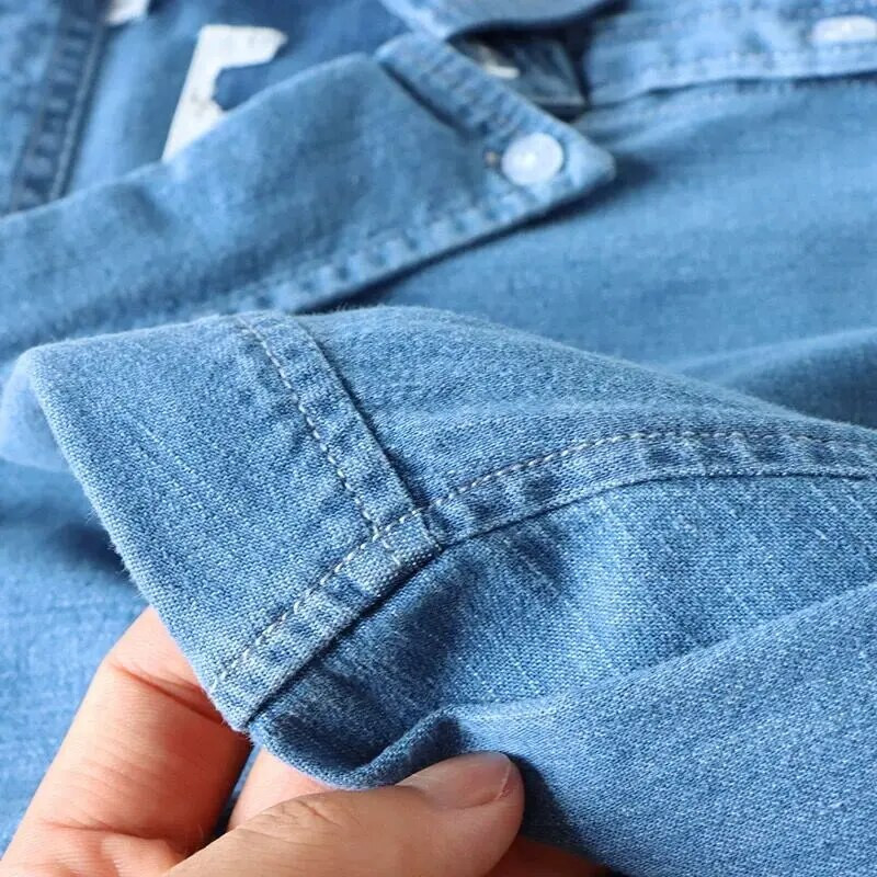 Modes vīriešu džinsa krekls 2023. gada pavasara rudenī, jauns ar garām piedurknēm ikdienas zils, brīvs vintage, vienkāršs studentu liela izmēra 4 XL džinsa krekls