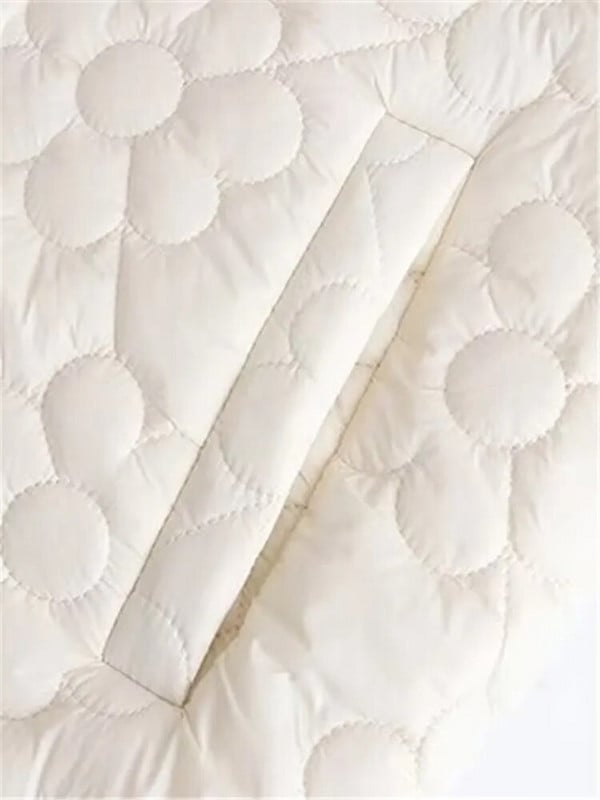 Γυναικείο χειμωνιάτικο μπουφάν με όρθιο γιακά με κουμπιά και floral καπιτονέ με βαμβακερό σάντουιτς στη μέση