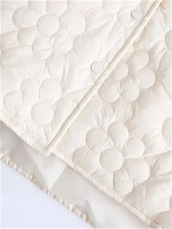 Γυναικείο χειμωνιάτικο μπουφάν με όρθιο γιακά με κουμπιά και floral καπιτονέ με βαμβακερό σάντουιτς στη μέση