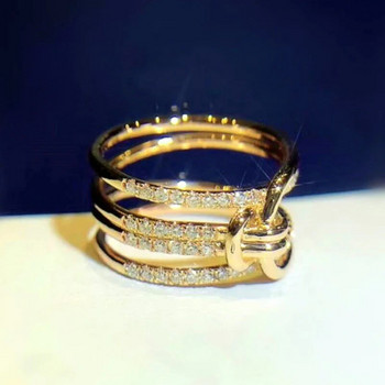 Huitan Creative Knot Design Γυναικεία δαχτυλίδια χρυσό χρώμα ιδιοσυγκρασίας Γυναικείο αξεσουάρ με εκθαμβωτικά κοσμήματα CZ Party Statement