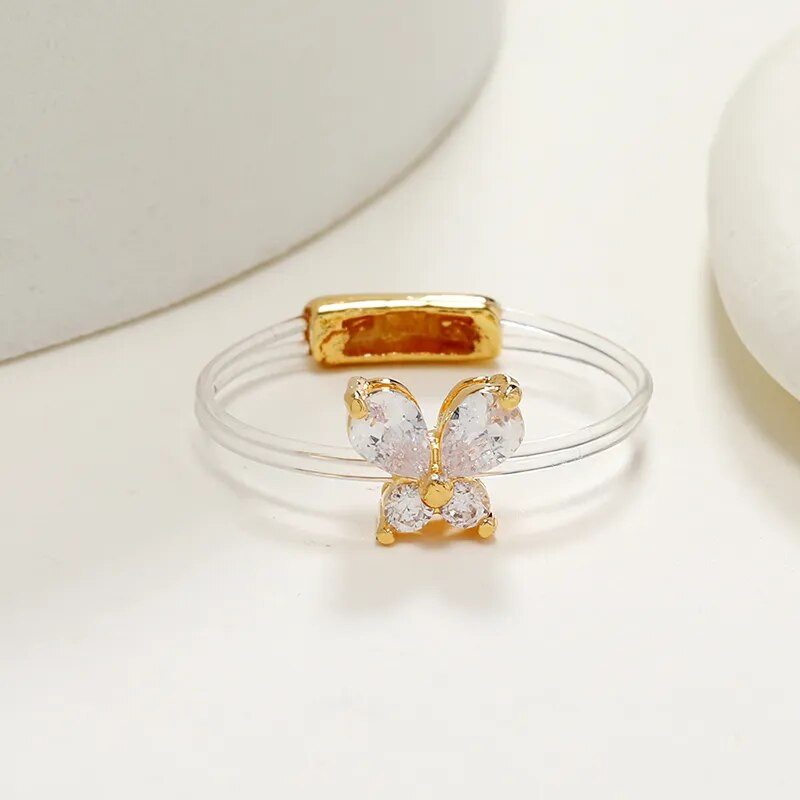 Jauns salds, moderns sieviešu gredzens modes neredzams caurspīdīgs līnijas misiņa gredzens Skaists tauriņš, cirkona rotaslietas aksesuārs, dāvana meitenei