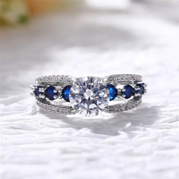 Huitan Специален интерес Сватбени пръстени Дамски сини/бели кръгли CZ Ново проектиран женски парти пръстен Темперамент Подарък Модерни бижута