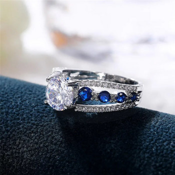 Huitan Специален интерес Сватбени пръстени Дамски сини/бели кръгли CZ Ново проектиран женски парти пръстен Темперамент Подарък Модерни бижута