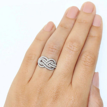 Huitan 2023 Нов дамски пръстен Twist Безкрайна форма Кристални пръстени с кубичен цирконий Изящни женски брачни ленти Модни бижута Маса