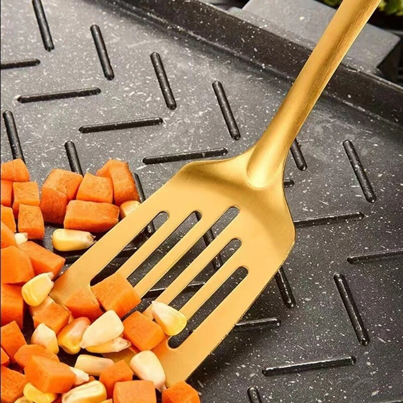 Korejas nerūsējošā tērauda virtuves gatavošanas piederumi Virtuves piederumi Piekarināmi Vakariņu zupa Caurduris Cepšanas lāpstiņa Sadzīves piederumi