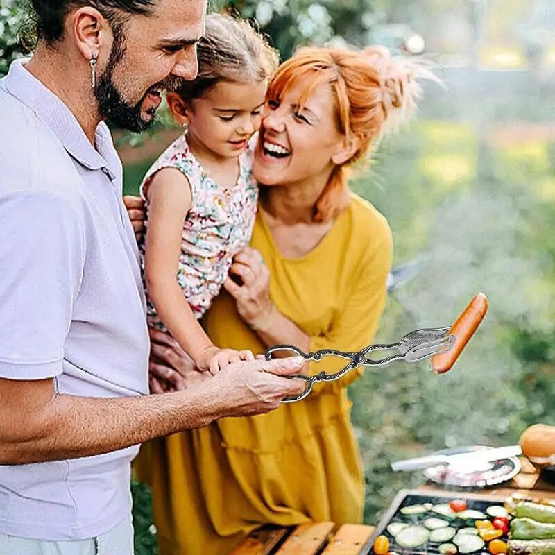 Roostevabast terasest toidutangid Toidulauanõud, mereandide serveerimisvahendid Praetud kala labidas Leivaklamber Köök majapidamises kasutatavad lihaklambrid