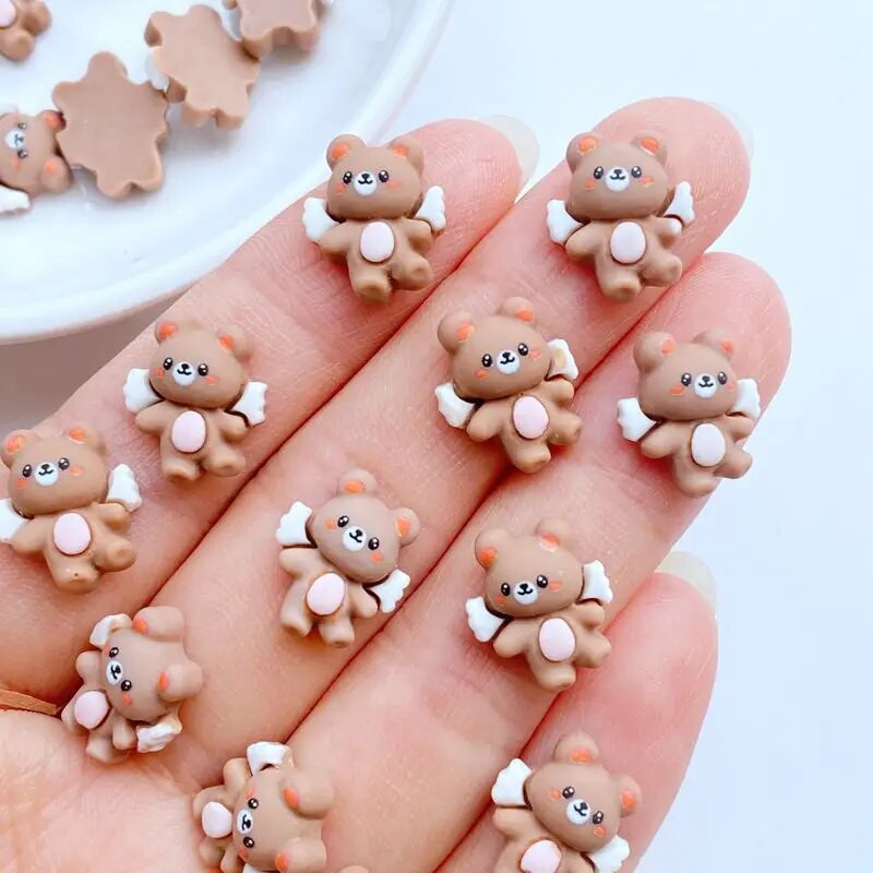 30Gb. Jauns Cute Mini 11*13mm Spārnotais lāča sveķu figūriņas Amatniecība Plakana muguras rotājumi Rotaslietas Matu izgatavošana Manikīra Aksesuāri