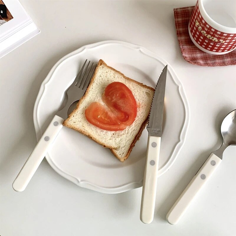 Galda trauku komplekts 3 gab. Nerūsējošā tērauda trauki karote nazis dakša ziloņkaula balts liekšķere steiks virtuve Rietumu galda piederumi mājas trauki