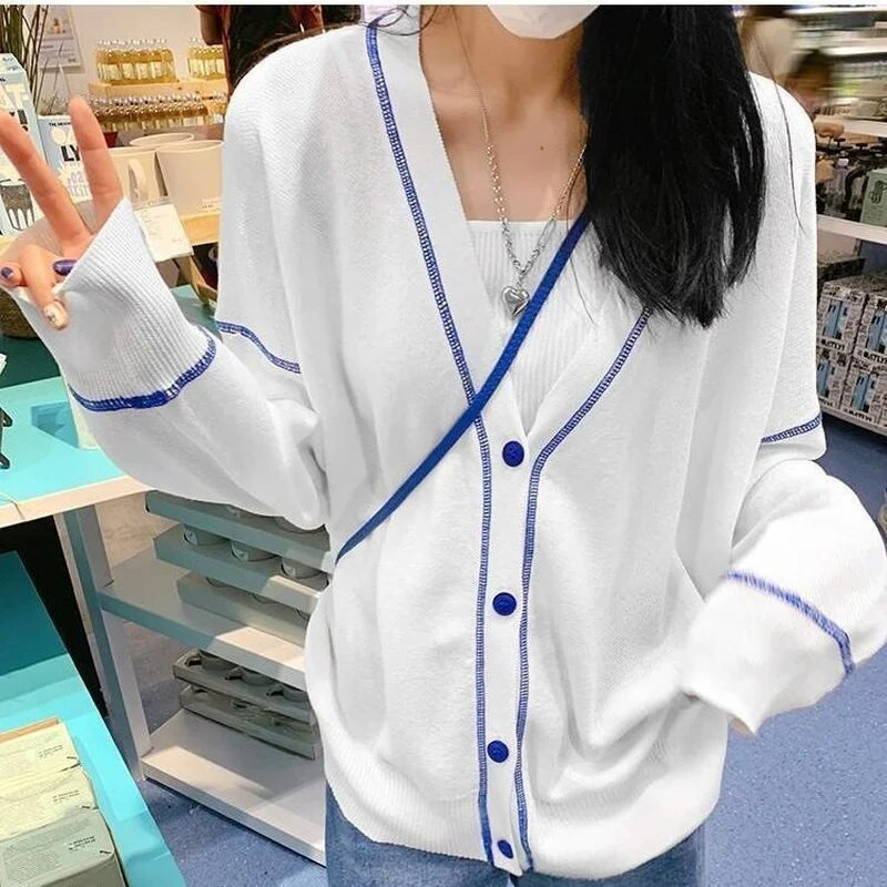 Sieviešu jaciņa, balts, raibs, brīvs plāns, pilnīgs korejiešu adījums ar garām piedurknēm Vasaras jauns sauļošanās līdzeklis Chandails Tunika Virsdrēbes