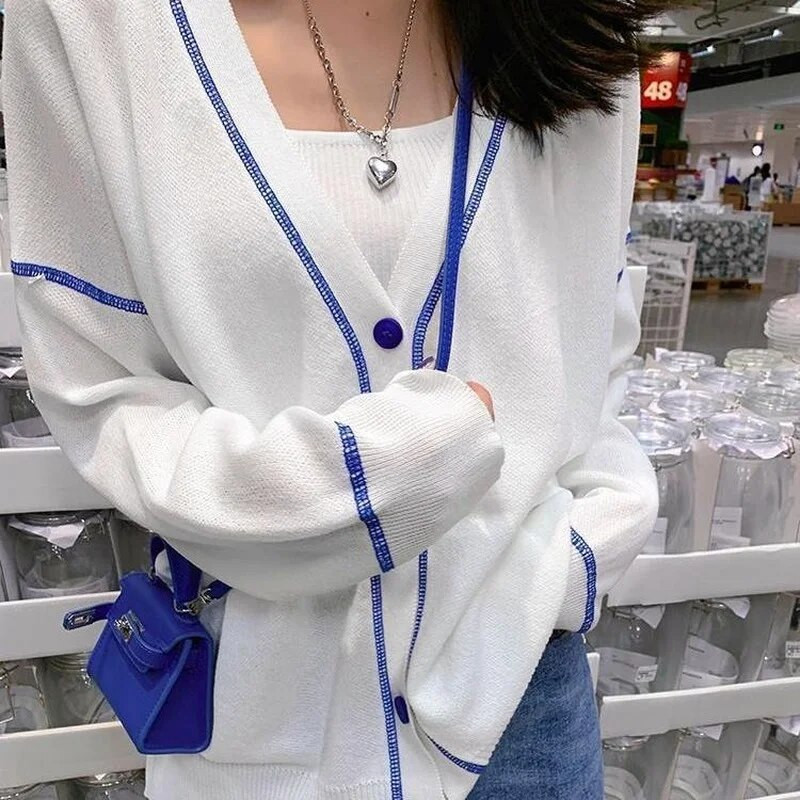 Sieviešu jaciņa, balts, raibs, brīvs plāns, pilnīgs korejiešu adījums ar garām piedurknēm Vasaras jauns sauļošanās līdzeklis Chandails Tunika Virsdrēbes