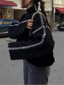 Kontrasta krāsa, trikotāža ar O veida kakla izgriezumu, garām piedurknēm, sieviešu džemperis.