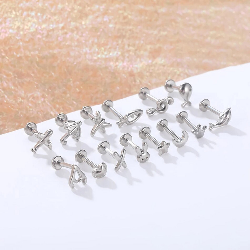 1 gab. Tērauda mēness apgaismojums Labret stieņa gredzeni kristāla zieds Tragus skrimšļa pīrsings stobra daivas auss spirāle caurduršanas skrūve, kas piemērota augšpusē 16g