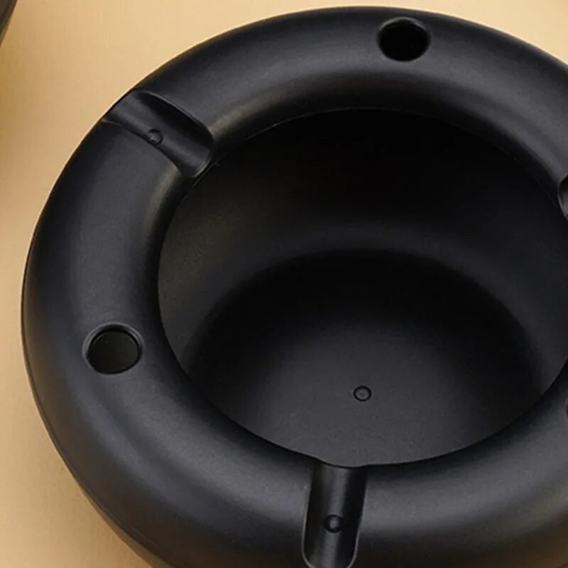 Jauns radošs vēja necaurlaidīgs apaļš pelnu trauks Videi draudzīgas pārnēsājamas automašīnas mājas dūmiem piederums karstumizturīgs pelnu trauks Ērta plastmasa