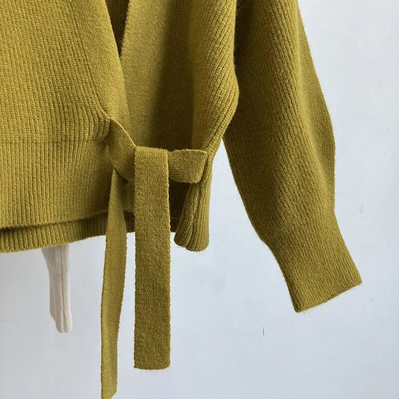 Korejiešu modes trikotāžas jaka sievietēm Augstas kvalitātes ikdienišķa V veida kakla laternas piedurknēm, mežģīņu piedurknēm, īss džemperis Dāmu elegants trikotāža