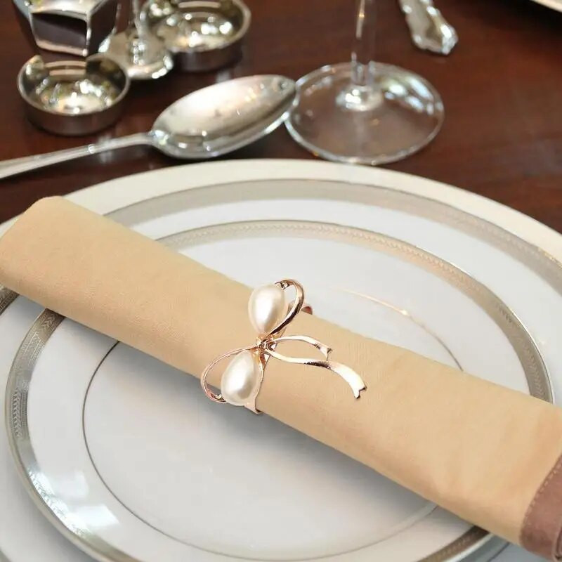 Pērļu salvešu gredzeni kāzu turētājs krelles salvešu turētājs loka mezgla forma salvete sprādze Ēdamistabas galda dekorēšana salvešu turētāji