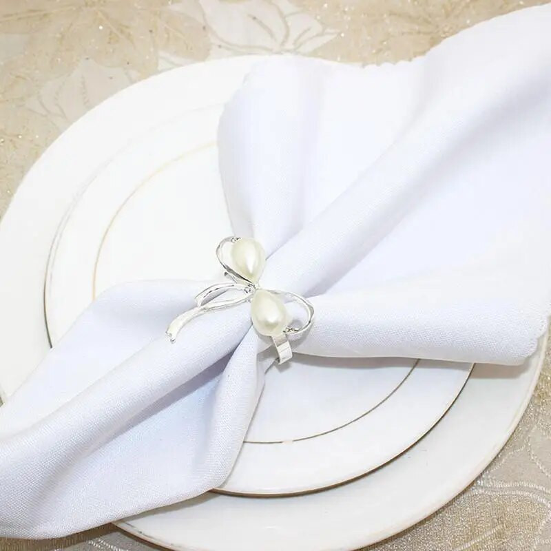 Pērļu salvešu gredzeni kāzu turētājs krelles salvešu turētājs loka mezgla forma salvete sprādze Ēdamistabas galda dekorēšana salvešu turētāji