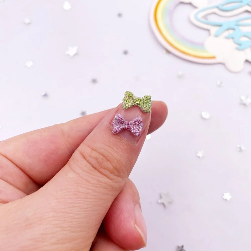 50 gab. 7*10 mm sveķu 3D krāsaini mini banīti, dārgakmeņi plakanā mugurā, figūriņas.