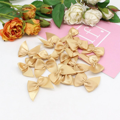 50 gab. Roku darbs Mini satīna lentes bantes Ziemassvētkiem Bowknot Dāvanu bantes amatniecībai Ziedu kāzu bantes dzimšanas dienas DIY ballītes dekorēšana