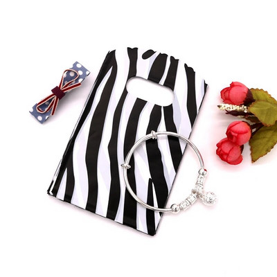 50 vnt. / Lot 9x15cm Maži plastikiniai maišeliai Kelių dizaino dovanų maišelių maišeliai Apyrankės Charms Papuošalų pakavimo maišeliai su rankenomis