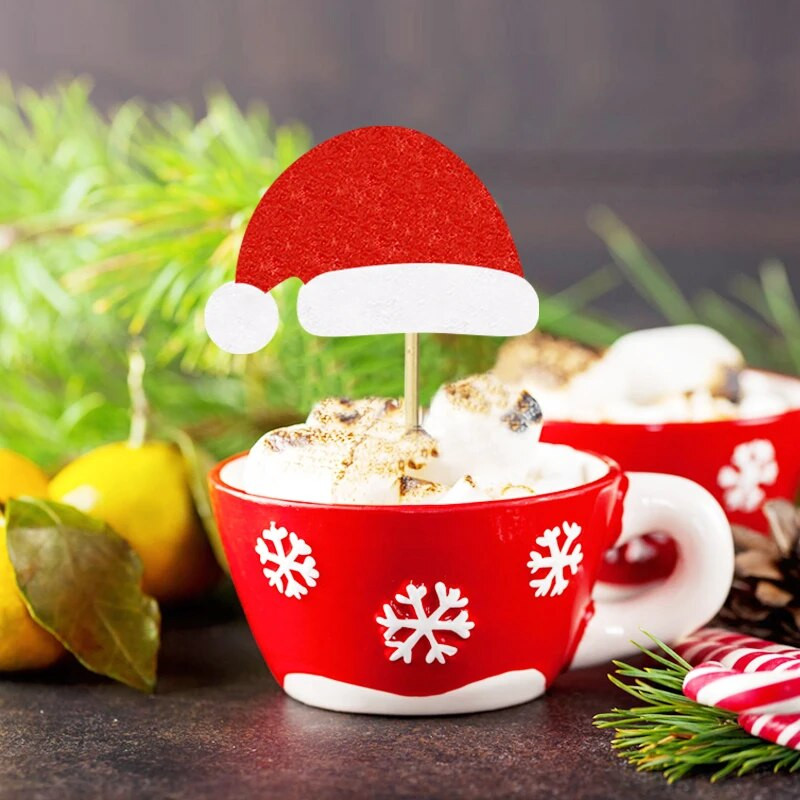 12 vnt kalėdinių keksų tvarsčių su snaigės kalėdinės eglutės kepuraitėmis.