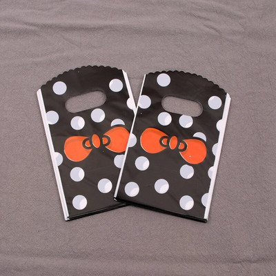 Нова модна търговия на едро с 50 бр./лот 9*15 см прости точки Мини пластмасова торбичка за подарък Малки торбички за опаковане на бижута с бонбони с дръжки