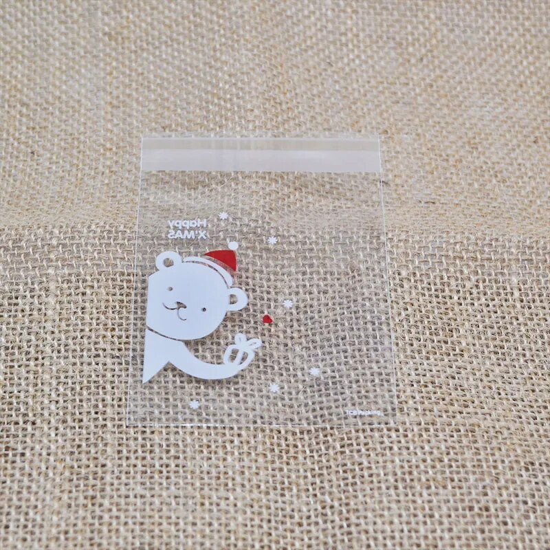 100 vnt Kalėdų saldainių maišeliai Mieli plastikiniai dovanų sausainiai Pakavimo maišeliai Sausainiai Užkandžiai Saldainių pyragai Pakavimo maišeliai Kalėdų dekoravimui