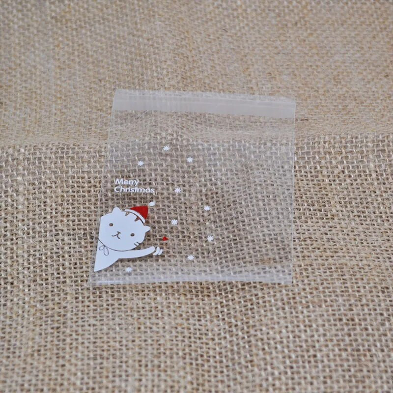 100 vnt Kalėdų saldainių maišeliai Mieli plastikiniai dovanų sausainiai Pakavimo maišeliai Sausainiai Užkandžiai Saldainių pyragai Pakavimo maišeliai Kalėdų dekoravimui