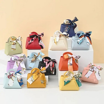 Кутия за бонбони в стил панделка Дамска чанта Европейски креативни сватбени кутии за бонбони Кожена ръчна чанта за бонбони Ins Подаръчен гръб Опаковка за бонбони