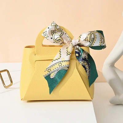 Κορδέλα τσάντα στυλ Κουτί ζαχαρωτών Ευρωπαϊκά δημιουργικά κουτιά ζαχαρωτών γάμου Δερμάτινα φορητά τσάντα καραμέλας Δώρο πίσω Συσκευασία καραμέλας