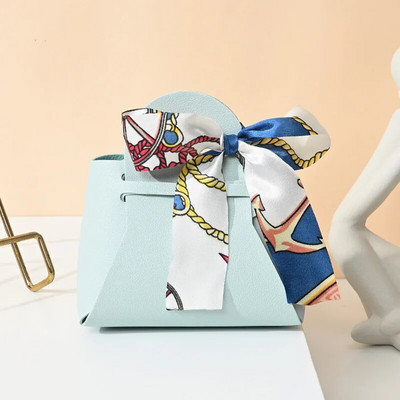 Κορδέλα τσάντα στυλ Κουτί ζαχαρωτών Ευρωπαϊκά δημιουργικά κουτιά ζαχαρωτών γάμου Δερμάτινα φορητά τσάντα καραμέλας Δώρο πίσω Συσκευασία καραμέλας