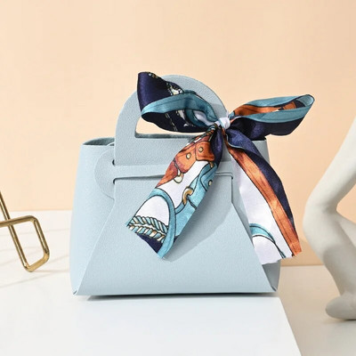 Κορδέλα τσάντα στυλ Κουτί ζαχαρωτών Ευρωπαϊκά δημιουργικά κουτιά ζαχαρωτών γάμου Δερμάτινα φορητά τσάντα καραμέλας Δώρο πίσω Συσκευασία καραμέλας