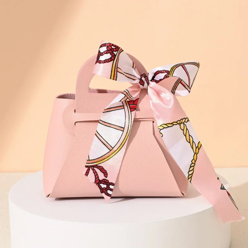 Κορδέλα τσάντα στυλ Κουτί ζαχαρωτών Ευρωπαϊκά δημιουργικά κουτιά ζαχαρωτών γάμου Δερμάτινα φορητά τσάντα καραμέλας Δώρο πίσω Συσκευασία καραμέλας