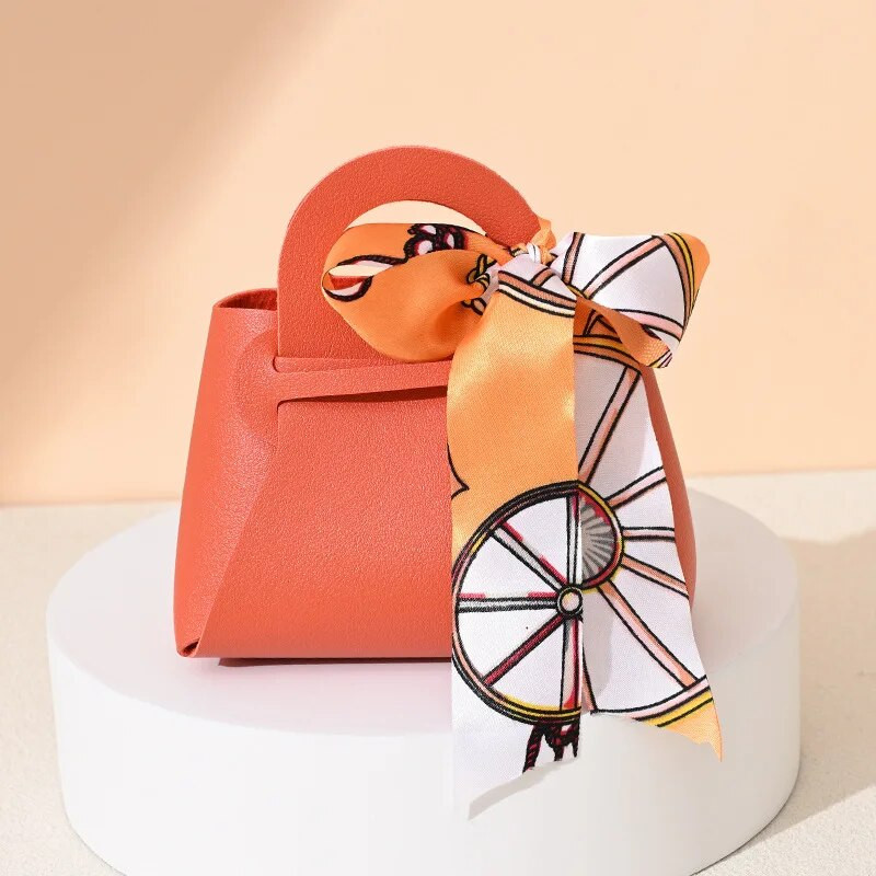 Κορδέλα τσάντα στυλ Κουτί ζαχαρωτών Ευρωπαϊκά δημιουργικά κουτιά ζαχαρωτών γάμου Δερμάτινα φορητά τσάντα καραμέλας Δώρο πίσω Συσκευασία καραμέλας