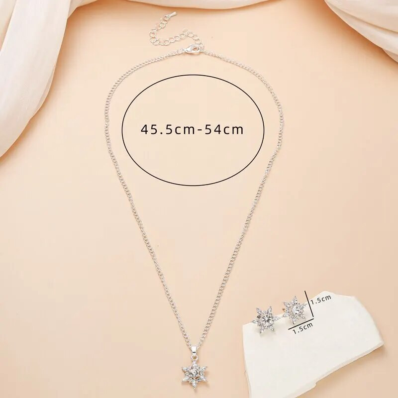 Lumehelbekujulised kristallist ehtekomplektid hõbedase värvi kaelakee kõrvarõngad tsingisulamist naisele peol pulmas luksuslik romantiline stiil