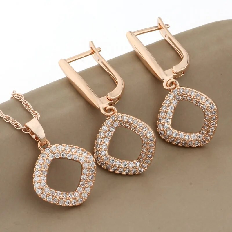 Luksuslikud naiste komplektid Kõrvarõngad ja ripats Kvaliteetsed läikiva kuupmeetri tsirkooniumoksiidist ehtekomplektid 585 roosa kullavärvi ehtekomplektid