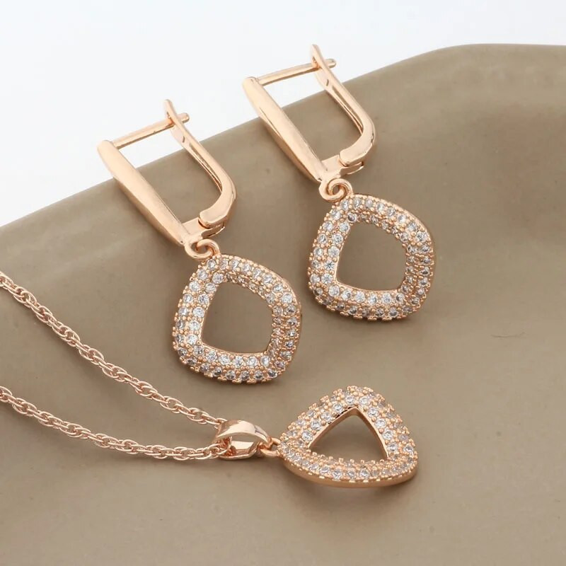 Luksuslikud naiste komplektid Kõrvarõngad ja ripats Kvaliteetsed läikiva kuupmeetri tsirkooniumoksiidist ehtekomplektid 585 roosa kullavärvi ehtekomplektid