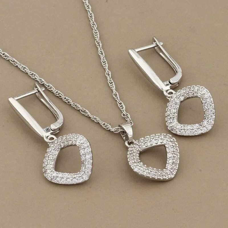 Luksuslikud naiste komplektid Kõrvarõngad ja ripats Kvaliteetsed läikiva kuupmeetri tsirkooniumoksiidist ehtekomplektid 585 roosa kullavärvi ehtekomplektid