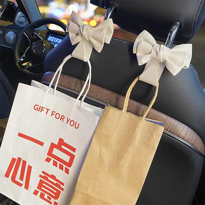 Automobilio sėdynės atlošo kablys Bowknot laikymo kabliukas PU odinis mados krepšys Daugiafunkcis kabliukas Įvairios nugaros kabliukas Vidaus priedai