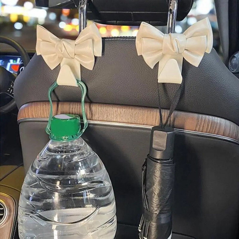 Automobilio sėdynės atlošo kablys Bowknot laikymo kabliukas PU odinis mados krepšys Daugiafunkcis kabliukas Įvairios nugaros kabliukas Vidaus priedai