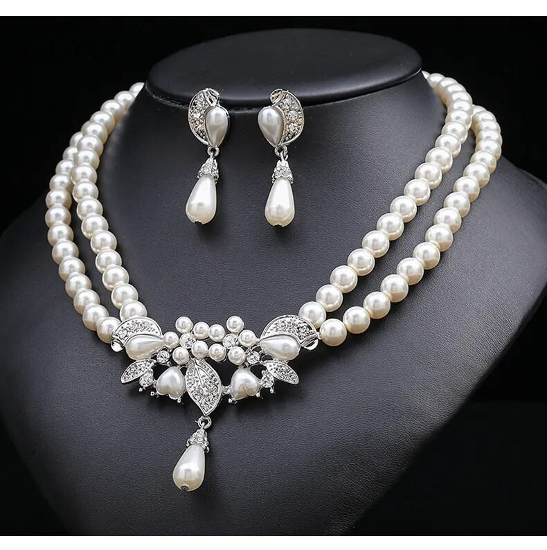 Πολυτελές Γυναικείο Κρυστάλλινο Σετ Κοσμήματα Γούρι Ασημί Χρώμα Γαμήλια Κρεμαστά Σκουλαρίκια Γυναικεία Κολιέ κολιέ με αλυσίδα με λευκή πέρλα