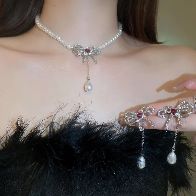 Γυναικεία σκουλαρίκια με μαργαριτάρι κολιέ FYUAN Γυναικεία σκουλαρίκια με κρύσταλλο παπιγιόν Γυναικεία σετ κοσμημάτων νύφης αξεσουάρ