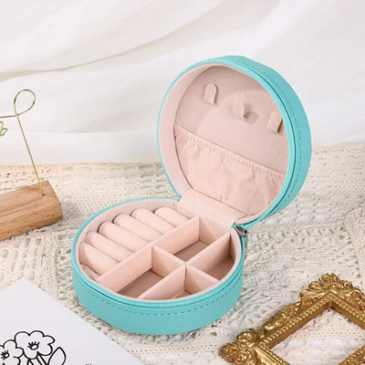 Kaasaskantav ümmargune ehtekarp Kaelakeed Kõrvarõngad Sõrmused Ehted Korraldaja Näidik Reisi ehtekarbid Pu-nahast hoiukarp